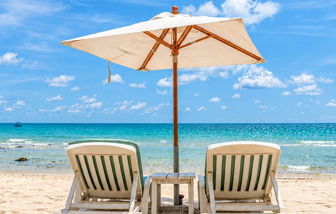 Before and after: a beach umbrella and two loungers, soft on one side and crisp on the other